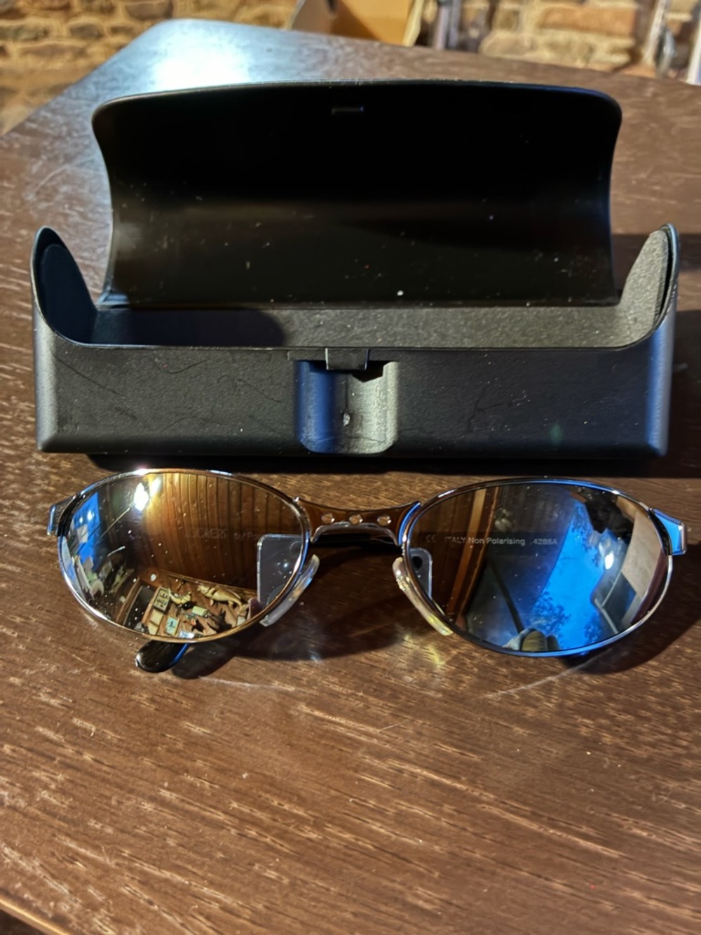 Vintage Polaroid Lookers Black Oval Sunglasses unisex